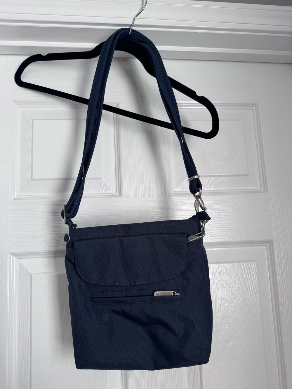 Travelon Dark Blue Compact Crossbody with Branded Metal Zip Pull